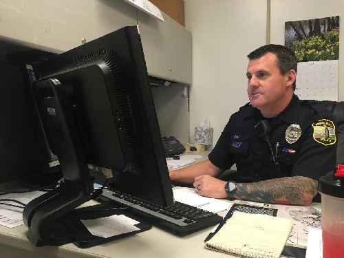OFFICER MARK WALBLAY operates from his office in the front of the school