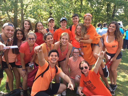 OPERATION SMILE TEAM orange gathered together for a group picture after a day of team games. 