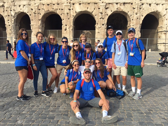 OPERATION SMILE TEAM blue in front of the Coliseum in Rome, Italy. 