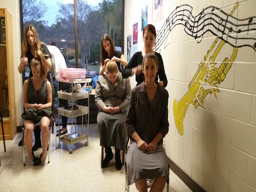 THEATER STUDENTS PREPARE to take the stage before Falcon Stage Companys rendition of The Giver.