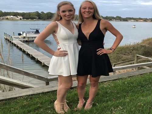 SENIORS EMMA BARNETT and Leah Crouse are dressed in white and black.