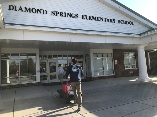 SENIOR MARK ROGERSON delivers school supplies to Diamond Springs.