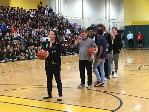 STUDENTS AND TEACHERS compete in a game of knockout.