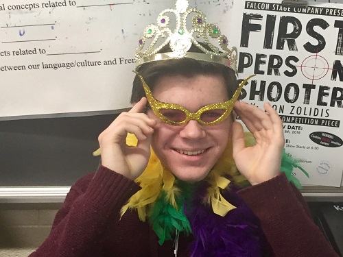 SOPHOMORE SHANE SANDERS found the “baby” in the beignet in his French class today, making him the King of Mardi Gras in his French II class.