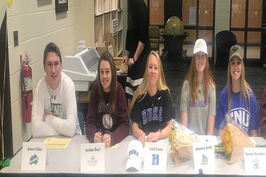 ON NATIONAL SIGNING day student athletes prepare to sign to their schools
