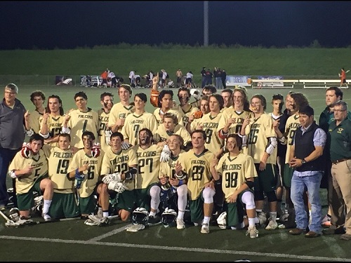 THE FALCONS LACROSSE team poses after a hard fought win.