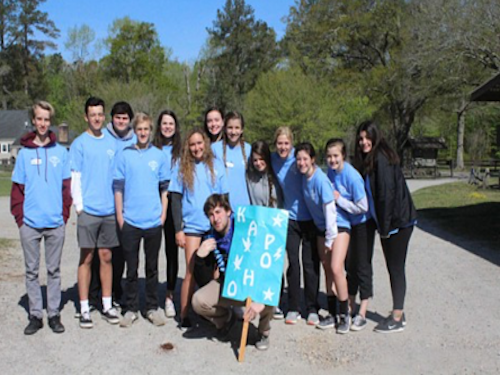 THE COUNCIL OF Kapoho poses with their leader Hayden Haupt.