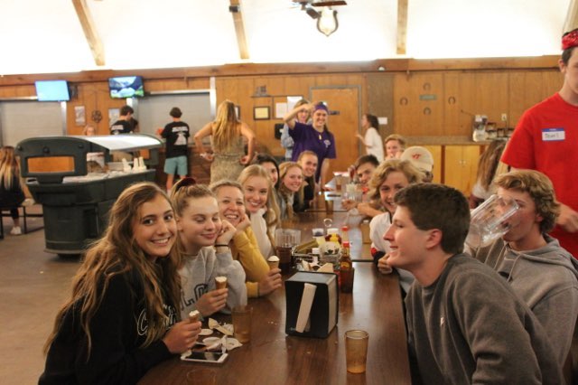 DELEGATES FROM THE council Muscogee eat lunch together. 