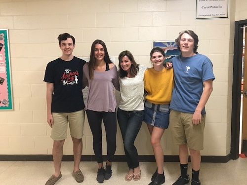 CLASS OF 2018 Editors-in-Chief and Adviser Erin Tonelson (center) for the Falcon Press online newspaper one month before they leave the nest. (Left-right) Seniors Ian Lichacz, Anna Michaud, Ben Darnell, and Audrey McGovern.