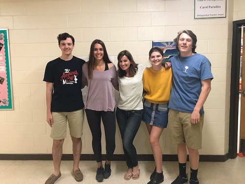 CLASS OF 2018 Editors-in-Chief and Adviser Erin Tonelson (center) for the Falcon Press online newspaper one month before they leave the "nest". (Left-right) Seniors Ian Lichacz, Anna Michaud, Ben Darnell, and Audrey McGovern.