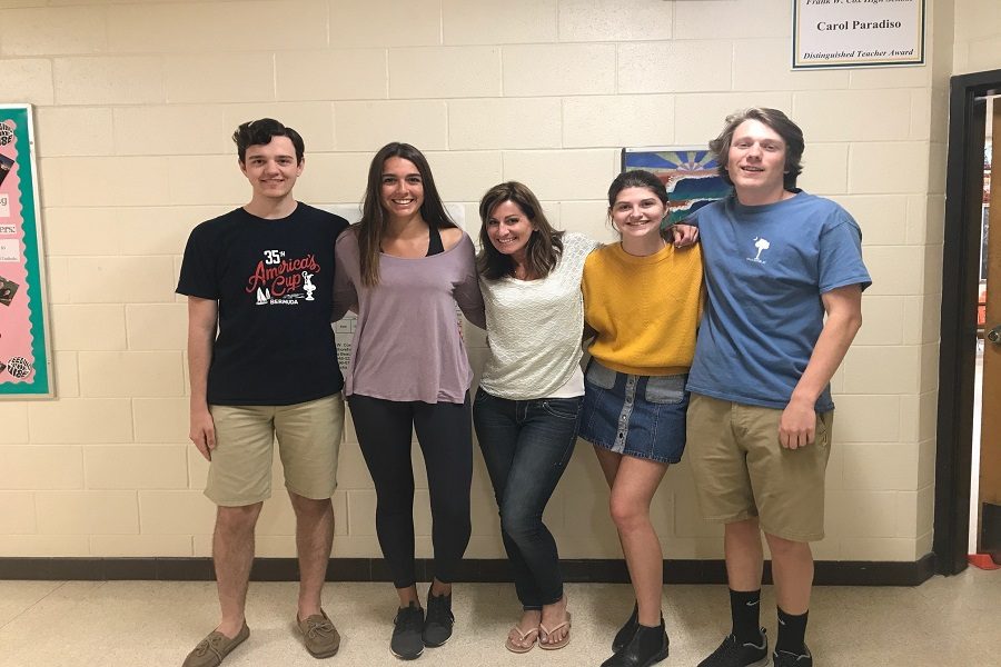 CLASS OF 2018 Editors-in-Chief and Adviser Erin Tonelson (center) for the Falcon Press online newspaper one month before they leave the nest. (Left-right) Seniors Ian Lichacz, Anna Michaud, Ben Darnell, and Audrey McGovern.