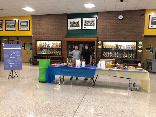 SOPHOMORE TESSA THIBODEAU and senior Michelle Song decorated tables for the Key Clubs annual faculty and staff breakfast on Thursday morning.