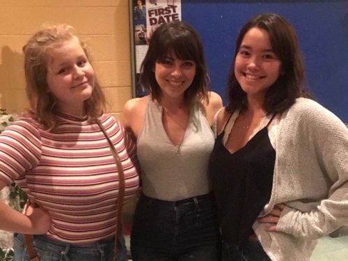 SOPHOMORE SYDNEY STRICKLAND (left) and junior Zoe Ferrell (right), representatives of the schools Fine Arts department, recently participated in a master class at the Little Theatre of Norfolk. Stage and screen actress Krysta Rodriguez (center) also participated in the class.