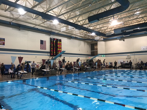 COX SWIM LINES up to compete. The Falcons have prepared for this meet with intense practices and conditioning.  
