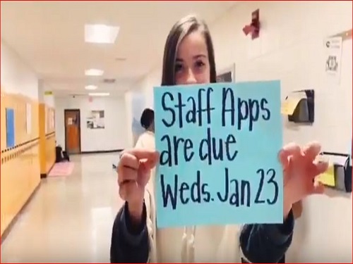 JUNIOR MIA LARUSSO shows students and staff that applications for Buddies Helping Buddies are due on Wednesday, Jan. 23. The staff has been working strenuously to help plan this event. 