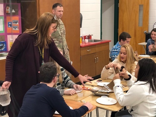 CULINARY ARTS STUDENTS take the opportunity to sample Meals Ready to Eat during their Career Direction presentation. Army Staff Sergeant Shawn Bartz gave an interactive presentation about life after high school in Mrs. Goodmans class.