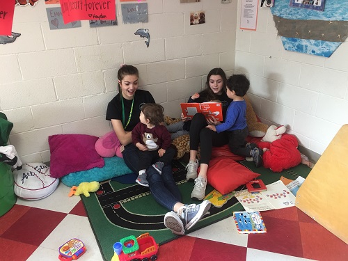 JUNIOR VIRGINIA TEACHERS for Tomorrow (VTFT) students Kaitlyn Piston and Sarissa Bryant read to children. The students visited Leaf Spring Preschool on Wednesday, February 13th, to get real world experience of working with children in a classroom setting.