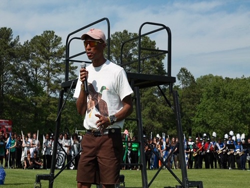 RECORDING ARTIST PHARELL Williams speaks to the crowd who gathered at Princess Anne High School for the Battle of the Bands competition. Williams returned to his alma mater to present the key to the City of Virginia Beach.