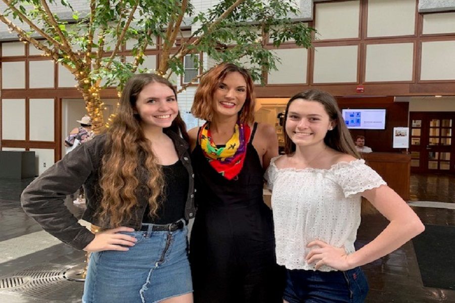 JUNIOR NAHS STUDENTS Sarissa Bryant (left) and Megan Piston (right) smile with NAHS sponsor Mrs. Van Veenhuyzen. Bryant and Piston participated in the local ceremony that celebrated projects reflective of the  African-American history within the community .