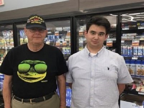 FRESHMAN PARKS SCHMIDT speaks with former Warrant Officer Glen Caldwell, a Vietnam veteran that he met in a local grocery store. Schmidt is intrigued by all things military and speaks to former service members regularly about their time in service.