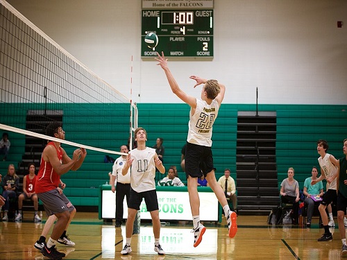 SOPHOMORE DANIEL HURLEY sets up for a hit. Boys volleyball defeated Princess Anne High School after five sets this week.