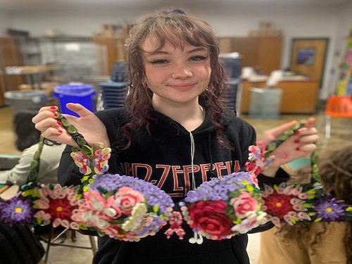 JUNIOR ALAINA WALTON and several other NAHS students recently entered their Bra-ha-ha creatiion in to the annual Breast Cancer Awareness event.  The bra was a creative piece using  a 38-C cup  as their canvas.