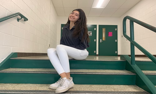 SENIOR ALEX PEREZ strikes a pose after telling her story. She was excited to share a little bit of her heritage. Ultimately her goal is to become a doctor.