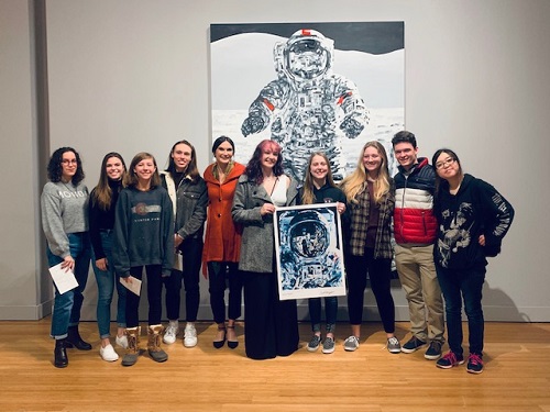 NAHS STUDENTS RECEIVE an autographed photo from the Michael Kagan: I Was There When it Happened exhibit at the Oceanfronts MOCA museum last week.  This particular photo is Kagans rendition of NASA astronaut Leland Melvin.
