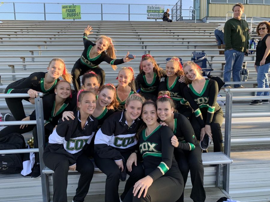COQUETTE DANCE TEAM prepares for a halftime performance in 2019 before the pandemic.  The team will show their award winning kick dance. 