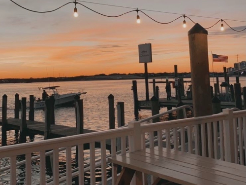 DOCKSIDE SEAFOOD RESTAURANTs view shows the beauty of the day. Customers  can enjoy their meal while sitting on the water. 