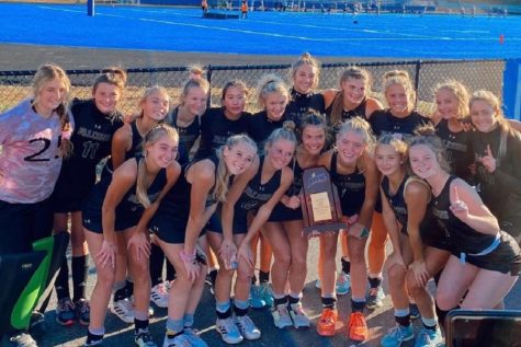 LADY FALCON FIELD hockey players show gratitude to their coaches and each other after winning their 4th consecutive state title. The girls are elated to have another championship under their belts after defeating First Colonial High School in the final championship game.