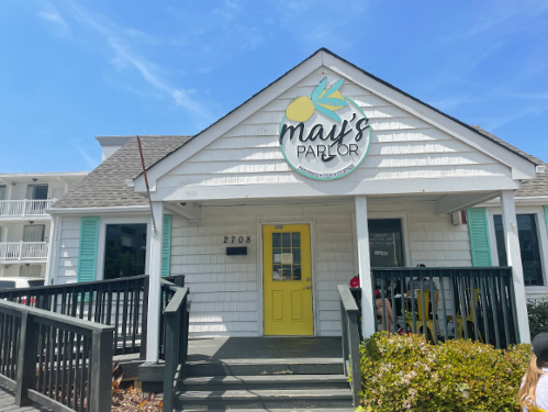 MAY'S PARLOR MIXES Virginia Beach vibes with a café atmosphere. The café, located at the Oceanfront, sells a lighter fair that include breakfast and lunch, along with a variety of pastries and beverages.