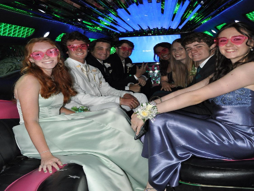 CLASS OF 2022 seniors headed to prom in a brightly lit limousine large enough to fit eight. Students reveled in the festivities provided for them at the Virginia Aquarium.