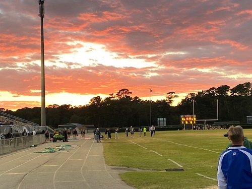 SUNSET DURING LAST years Homecoming shows a calm before the storm of fans bring school spirit to the field. Although the Stallions of Green Run High School beat the Falcons in the Homecoming game, students,faculty, staff, and fans left it all on the field.