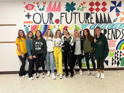 STUDENTS FLAUNT THEIR best green and gold attire for the final day of spirit week. School spirit was seen all throughout the halls, in classrooms, and everywhere students looked.