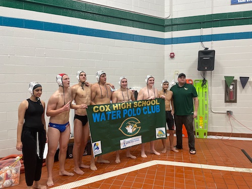 WATER POLO PLAYERS win the Beach District championship match. The team defeated the Ocean Lakes Dolphins for the title and will move on to regional matches.
