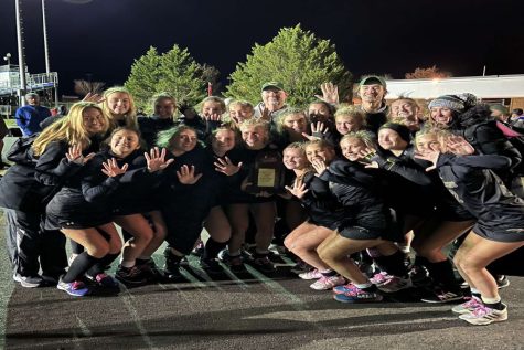 LADY FALCON FIELD hockey team brings home their 5th back to back state championship win, bringing them to 24 total state titles.  The girls hold up five fingers to represent their five consecutive  titles. 