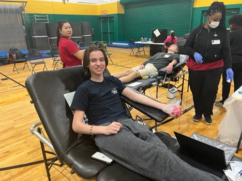 SOPHOMORE CHRIS WARD takes a recess after having his  blood taken. The annual CHS blood drive was a huge success in which many students volunteered their time to help the community.