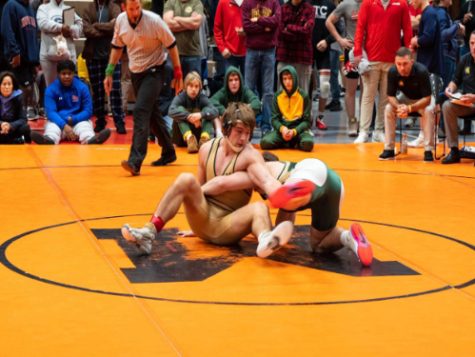 SENIOR TYLER HALEY practices a reversal technique on his opponent called the switch. Haley is grateful for everything he has learned not only in this sport, but over the last four years in high school. 