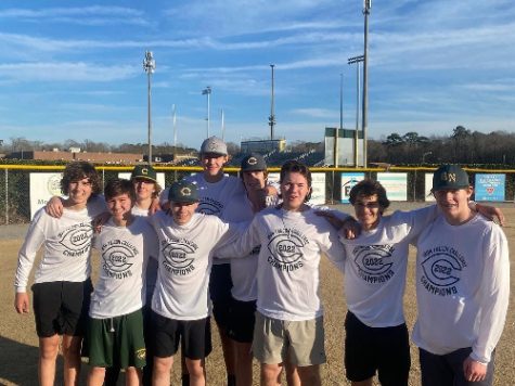 IRON FALCON CHAMPIONS celebrate together for a picture. Former player Ben Adams was the leader of this team.
