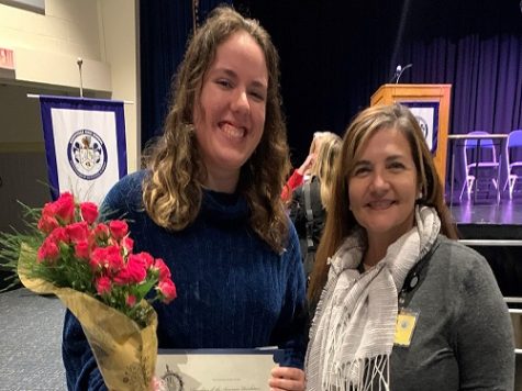 JUNIOR DESIREE BURTON (left) recently earned an award through her service with the Daughters of the American Revolution (DAR) organization and was praised by her Advanced Placement United States History teacher Mrs. Faircloth. I only hope to pave my own way in the world and continue their examples of where hard work and perseverance can lead. Burton said.