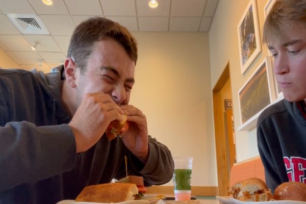 JUNIOR MAXWELL PALMERTON takes a bite out of his Panera BLT sandwich. I loved the BLT sandwich, and I
cant wait for dessert, Palmerton said.
