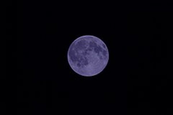 A BLUE MOON lights up the night sky in one of its rare occurrences. While the moon does look blue in color, it is actually due to a persons optics and how one perceives color and light.