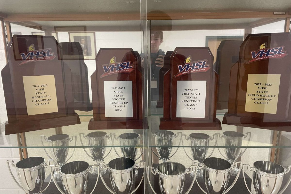 FALCON STATE CHAMPIONSHIP trophies shine brightly in the glass cases in the CHS foyer year round. After winning 58 state championships in total, its imperative that the display case stays up to date.