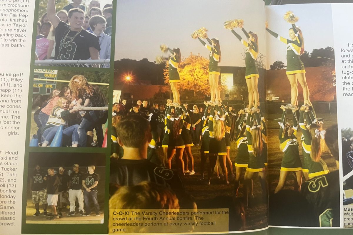 CHEERLEADERS CELEBRATE AT an annual bonfire in 2013. Most Falcon traditions have remained similar to those in years past.