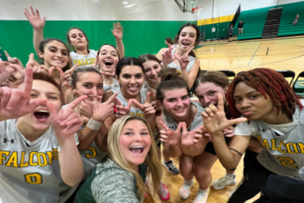 GIRLS BASKETBALL CELEBRATED their victory against Maury High School in their first scrimmage last week. The team went on to win their second scrimmage as well against Portsmouth Christian.