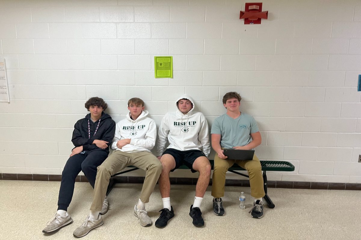 ¨ THE BOYS ¨ SIT and think about their discussion topics. They talked about sports, this weeks course fair, and spirit week.
