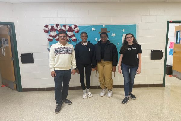 FALCON FORENSICS TEAM welcomes new members as well as  new sponsor, Mr. Marquez. Some of the Forensics team members include(left to right) junior Emily Cotter, sophomore Aliyah Bah, and junior Asyatou Bah.