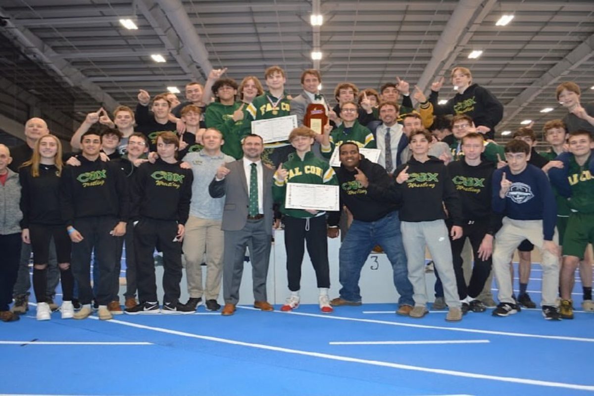 CHS WRESTLING CELEBRATES their most recent state win, the first since 2010. The Falcons dominated other wrestling programs from around the state, scoring the most points at the tournament. 