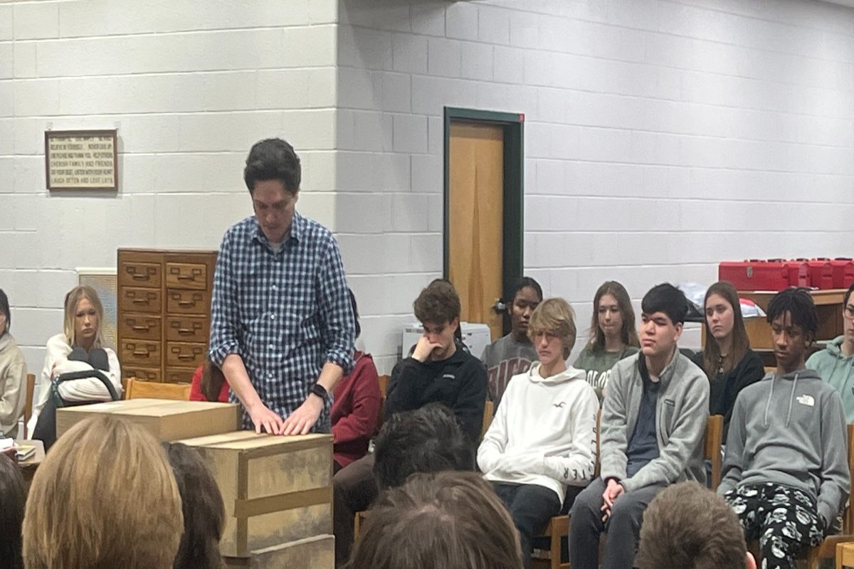 VIRGINIA STAGE COMPANY performs Every Brilliant Thing in the CHS Library. The heart-filled story was surrounded by an onlooking audience. 
